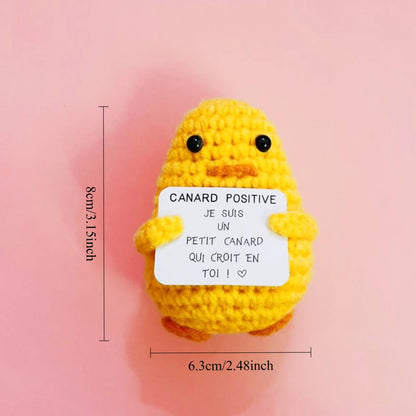 Peluche Canard Positif jaune au crochet tenant une pancarte “Je suis un petit canard qui croit en toi”, format mini 8 cm.